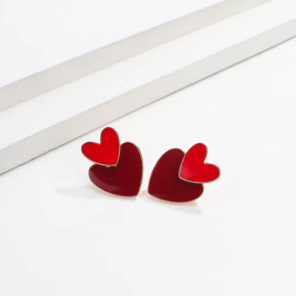 Aretes de corazon doble Alala